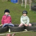 Children sitting around at NRC