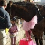 Pink Day people gathering together with the horses in support