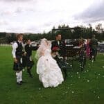 Bride and Groom arriving in horse and Carriage