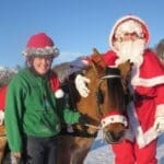 chirstmas Holiday, people and santa with Horse
