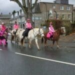 Pink Day event - riding horses through town