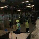 Exam - People in stables with their horses